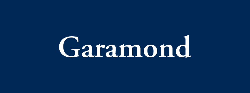 Garamond typeface displayed in white on a navy blue background.