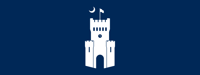 The Citadel tower brandmark in white on a navy blue background.